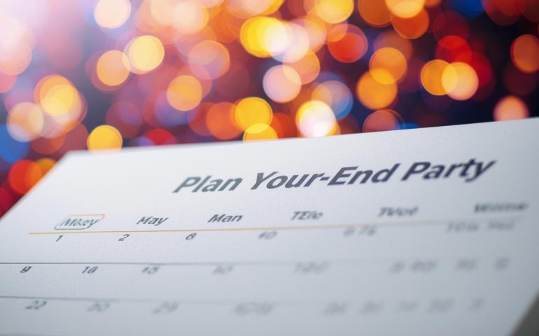 Team planning a year-end office party using calendar invites for easy scheduling